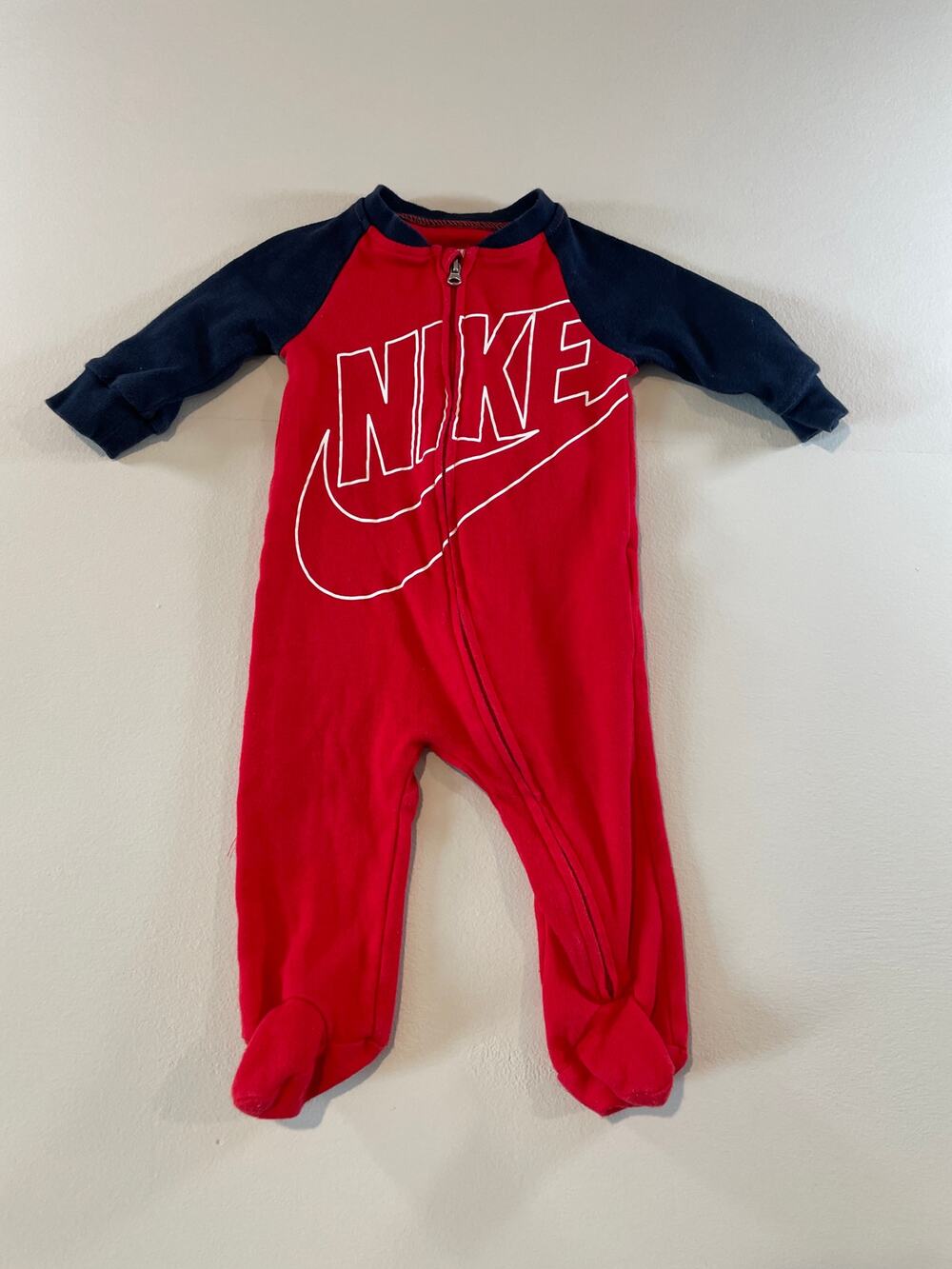 Nike Baby Foot Logo Zip One‑Piece Pajama – Size 6 Months